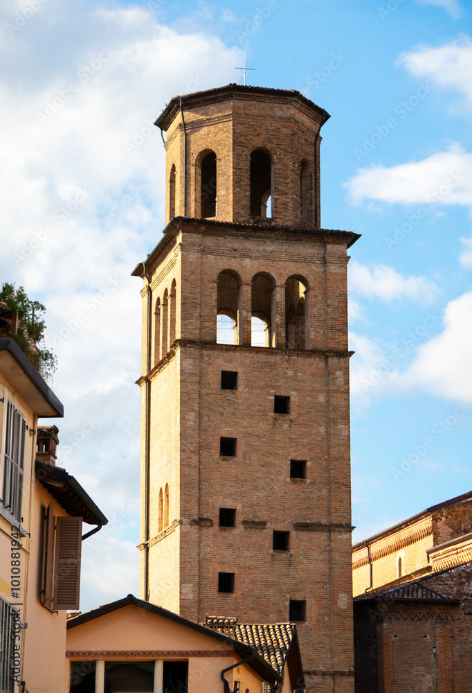 Urban landscape of Parma showing alley and cathedral's famous bell tower Urban landscape of Parma showing alley and cathedral's famous bell tower