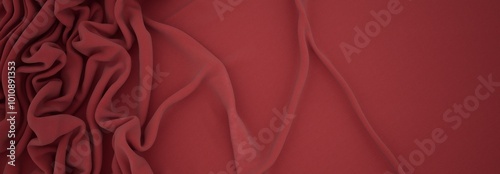 Elegant drapery of delicate burgundy fabric. 