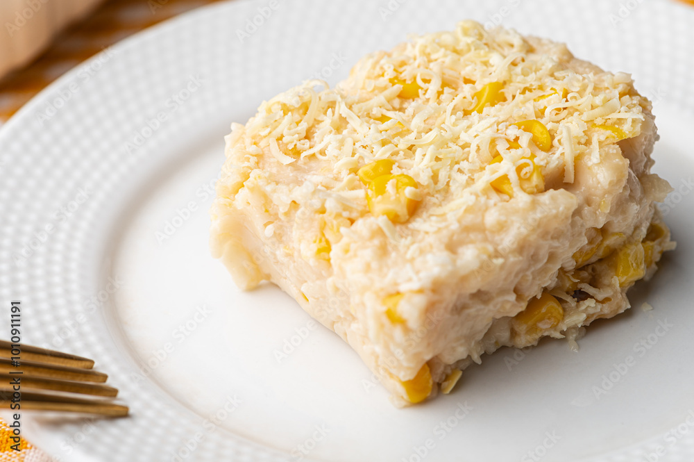 Cheesy Pinoy Maja Blanca - A dessert with a gelatinous texture primarily made from coconut milk, commonly referred to as coconut pudding. It is typically served during fiestas and holiday celebrations Cheesy Pinoy Maja Blanca - A dessert with a gelatinous texture primarily made from coconut milk, commonly referred to as coconut pudding. It is typically served during fiestas and holiday celebrations