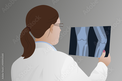 A radiologist in a medical clinic and a traumatologist analyze leg fractures. X-ray of the knee joint. Ultrasound. A leg injury in the knee joint.