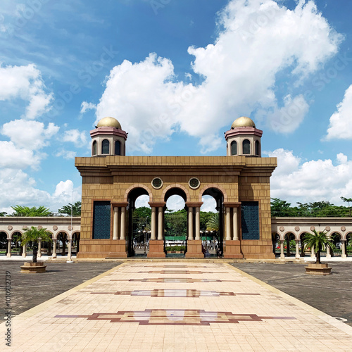Gate of Mosqoue, the Samarinda Islamic Center Mosque with a blue sky, located in Samarinda City, East Borneo photo