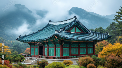 Traditional Korean Architecture Amidst Misty Mountains