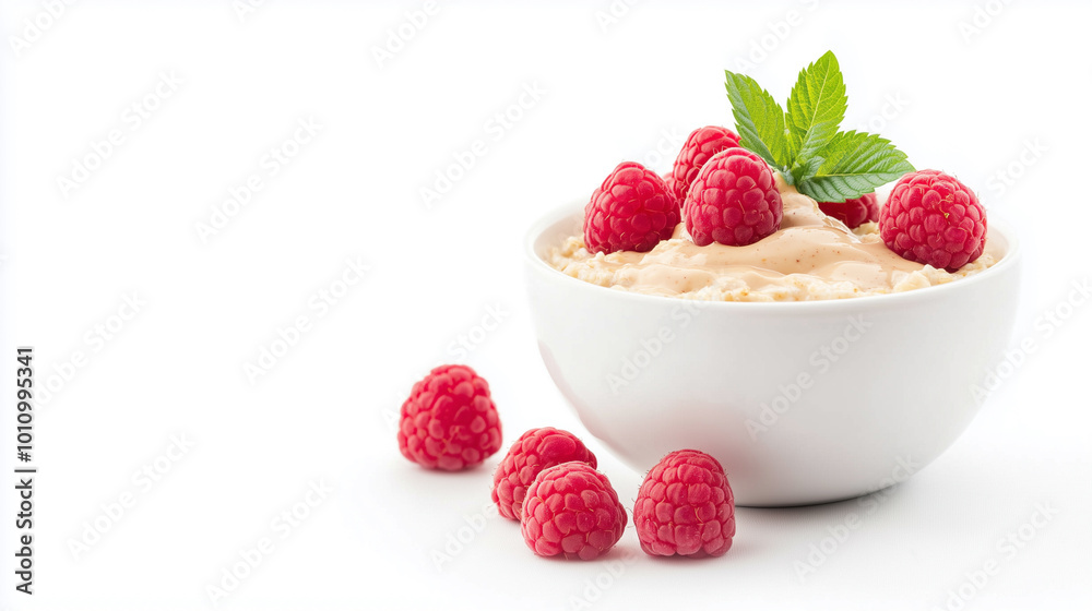 Creamy yogurt topped with fresh raspberries and mint leaves creates delightful and healthy snack. vibrant red berries contrast beautifully with smooth yogurt, making it visually appealing. Creamy yogurt topped with fresh raspberries and mint leaves creates delightful and healthy snack. vibrant red berries contrast beautifully with smooth yogurt, making it visually appealing.