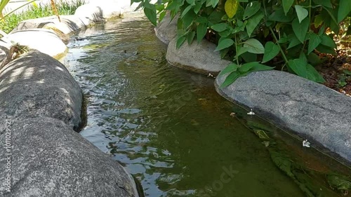 Small River Leads to a Fountain Pool in the park