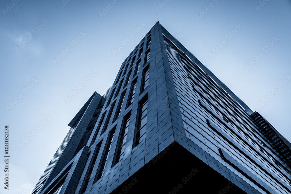 Modern Skyscraper Captured from a Dramatic Low Angle Perspective Modern Skyscraper Captured from a Dramatic Low Angle Perspective