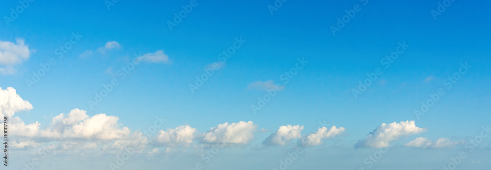 © evening_tao - Tranquil Blue Sky with Soft White Clouds © evening_tao - Tranquil Blue Sky with Soft White Clouds