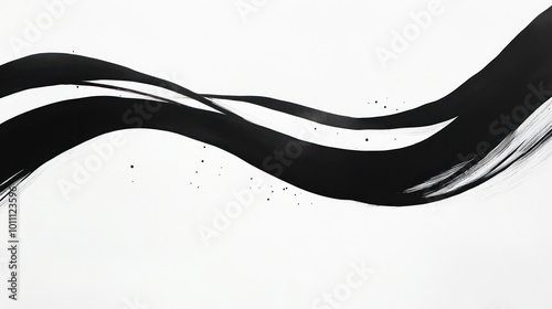 Abstract black brush strokes on a white background, conveying simplicity and elegance.