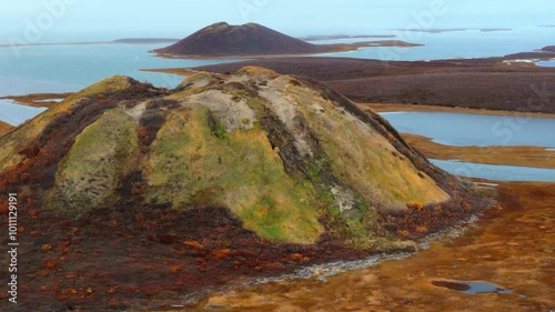 A Scenic View of Pingo Landmark, a Geographical Feature Near the Community of Tuktoyaktuk in the Northwest Territories (NWT), Canada - Aerial Drone Shot photo