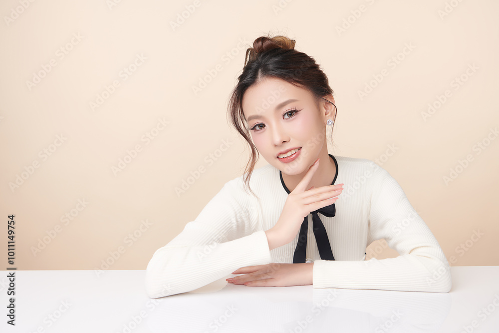 Beautiful young asian woman with clean fresh skin on beige background, Face care, Facial treatment, Cosmetology, beauty and spa, Asian women portrait. Beautiful young asian woman with clean fresh skin on beige background, Face care, Facial treatment, Cosmetology, beauty and spa, Asian women portrait.