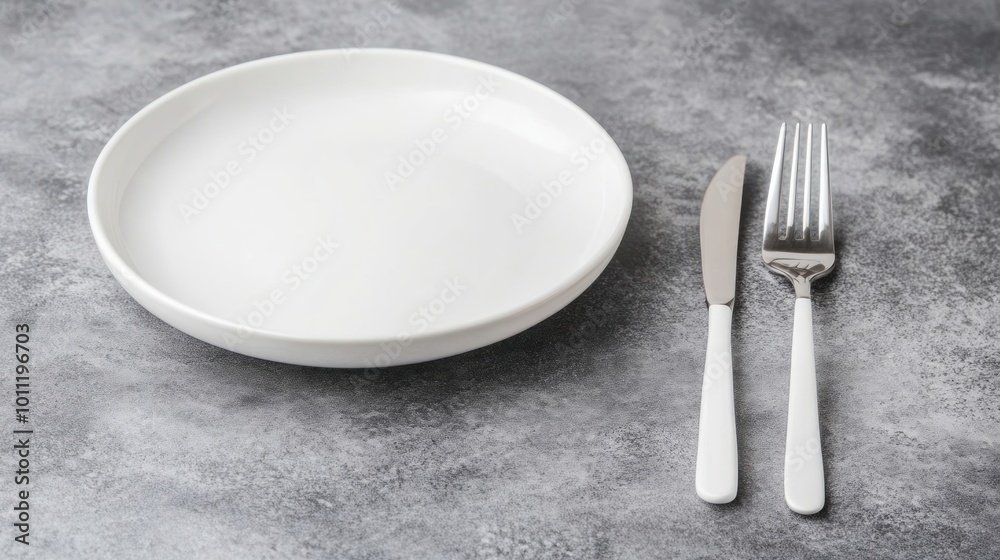 Empty Plate with Fork and Knife on Grey Background. Empty Plate with Fork and Knife on Grey Background.