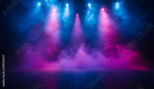 A stage illuminated with blue and purple spotlights, creating a vibrant atmosphere perfect for concerts, performances, or events. The dynamic lighting enhances the energy of the scene, making it ideal