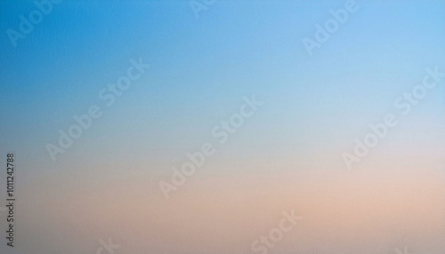 A serene gradient sky transitioning from blue to soft pink, evoking calmness and tranquility.