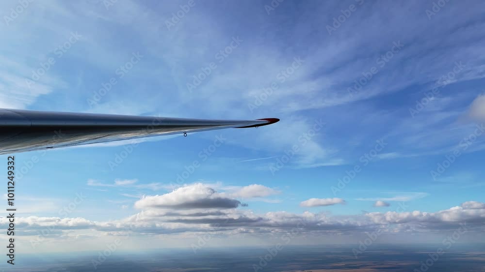 Gliding under the clouds Gliding under the clouds