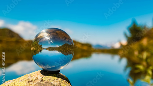 Photography Crystal ball alpine summer landscape shot with a lake at the famous Mount Goldri