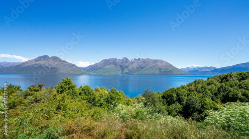 New Zealand South Island lake and mountain on a beautiful blue sky day - concept of outdoor, travel, nature, landscape 
