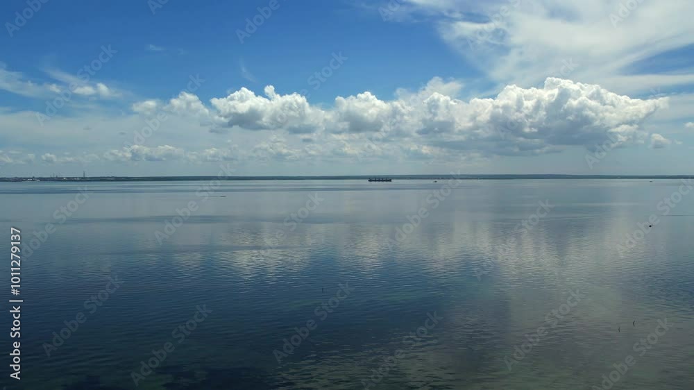 drone shot of a cargo ship in the middle of a lake drone shot of a cargo ship in the middle of a lake