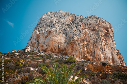 Wallpaper Mural Majestic rocky cliff under a clear blue sky Torontodigital.ca