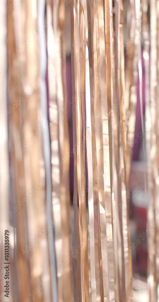 An abstract image showcasing shimmering metallic strips that come in various hues, patterns, and textures soft focus stage decoration An abstract image showcasing shimmering metallic strips that come in various hues, patterns, and textures soft focus stage decoration