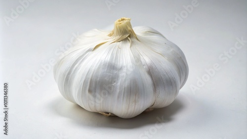 Single bulb of garlic isolated on white background.