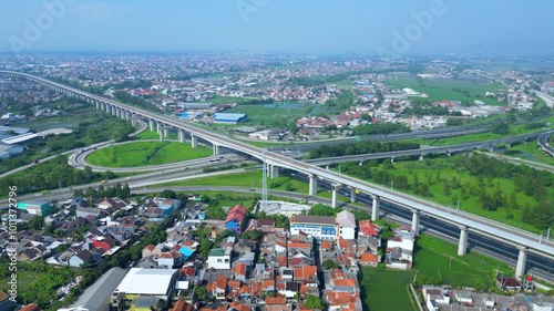 Title	
Established Aerial View of Pasir Koja Interchange, the meeting point of Soroja Toll Road, Purbaleunyi Toll Road and Jakarta-Bandung High Speed ​​Rail Line, Bandung, Indonesia photo