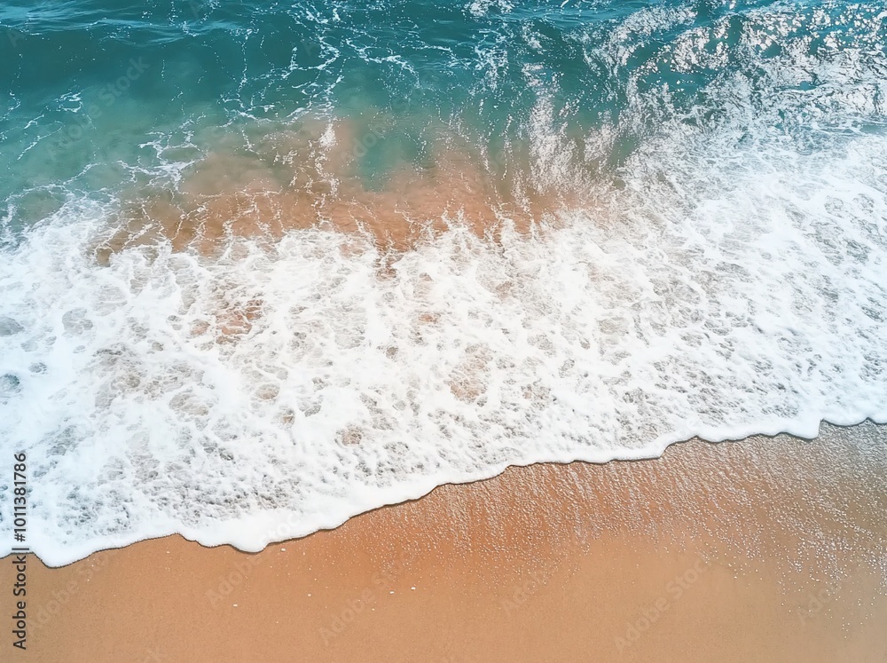 A serene beach scene with gentle waves lapping at the sandy shore. A serene beach scene with gentle waves lapping at the sandy shore.