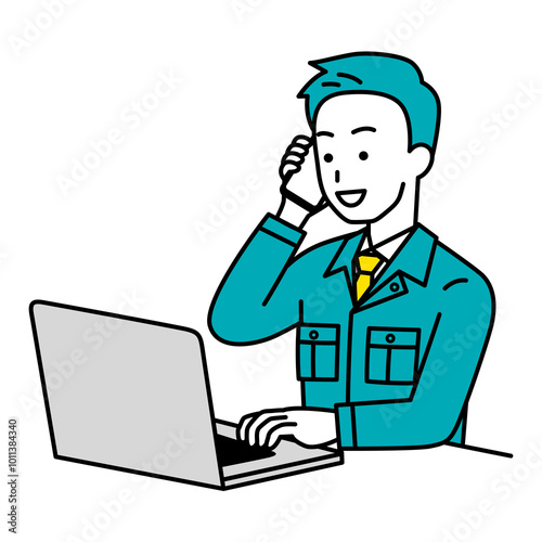 電話をしながらノートパソコンで仕事をしている作業員の男性