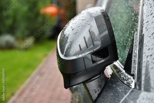 Selective focus of Car Mirror blind spot detection. Rain drops