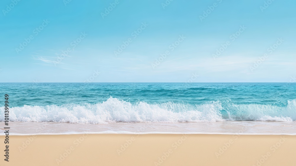 Obraz premium Scenic beach view with turquoise water and gentle waves against a clear sky.