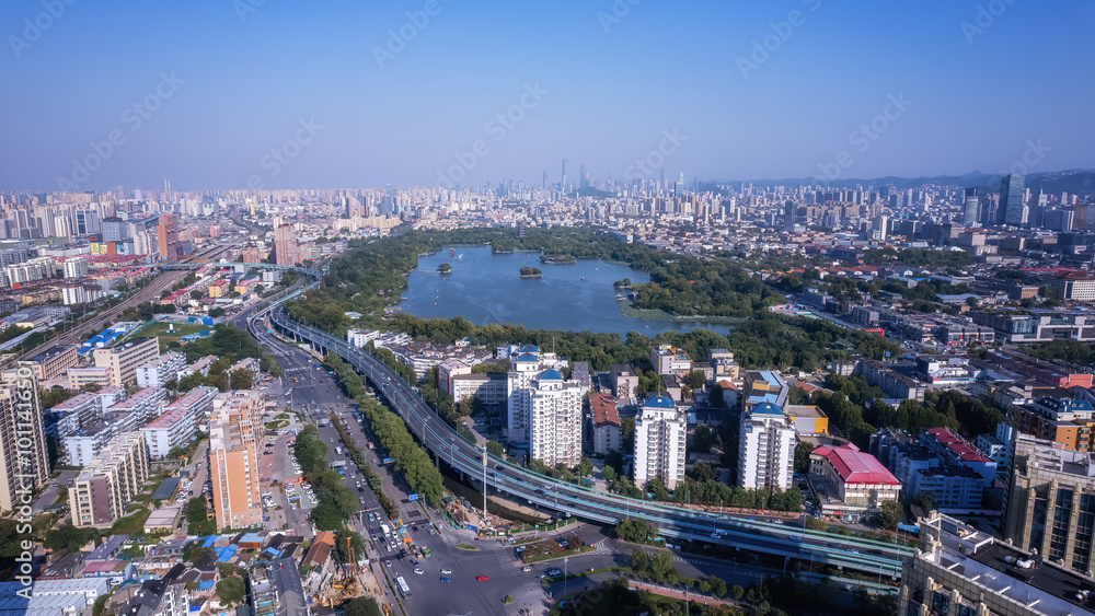 Aerial View of Urban Lake Surrounded by Cityscape Aerial View of Urban Lake Surrounded by Cityscape