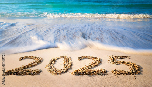 "2025" Written in the Sand with Waves Approaching