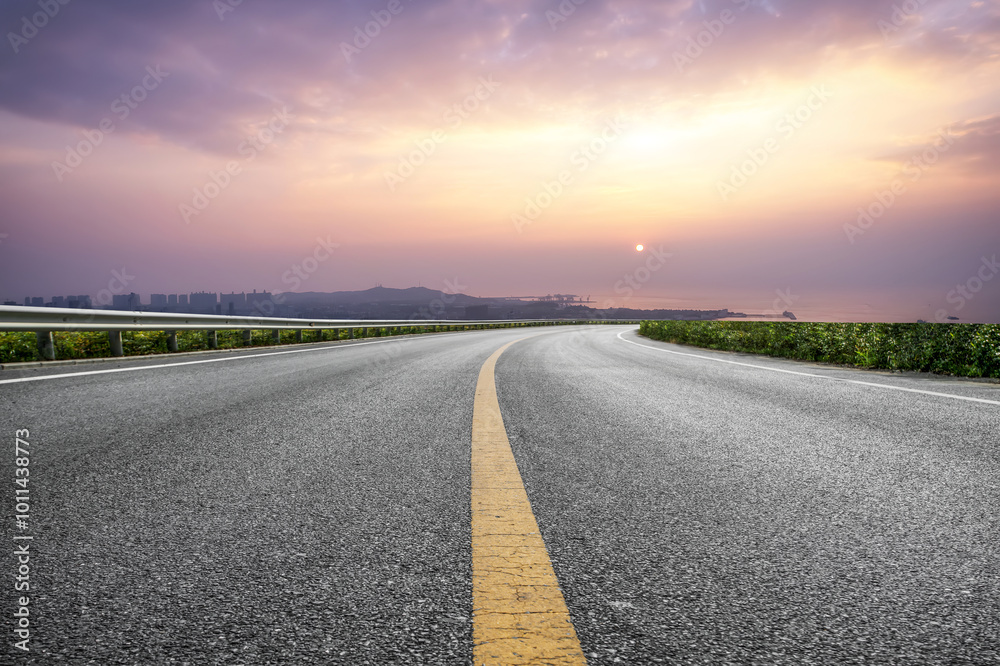 Serene Curved Road at Sunset Surrounded by Nature Serene Curved Road at Sunset Surrounded by Nature