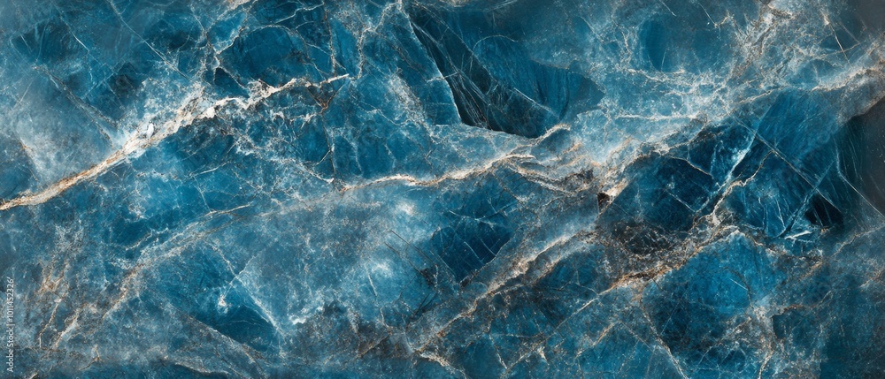Obraz premium A blue and white marble wall with a blue and gold pattern