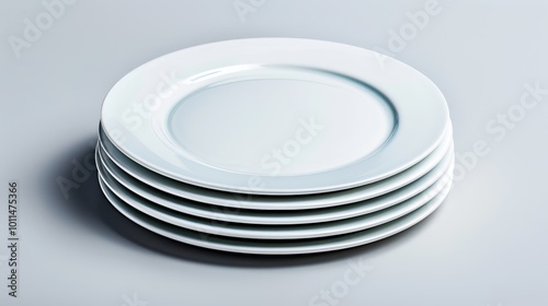 Stack of White Dinner Plates on Grey Background