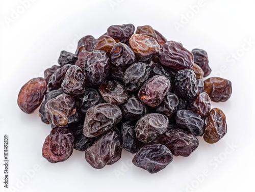 A colorful mix of dried grapes displayed on a white background