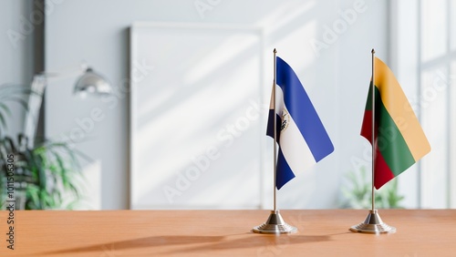 FLAGS OF EL SALVADOR AND LITHUANIA ON TABLE