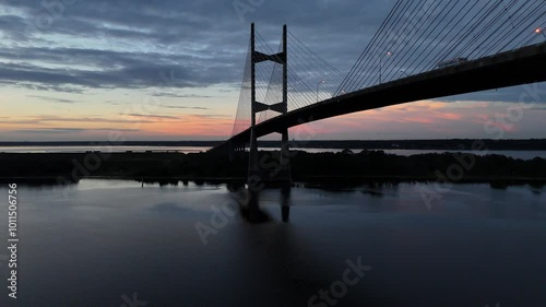 Dames Point Bridge over the St. Johns River at Sunrise with Traffic in Jacksonville, Florida USA photo