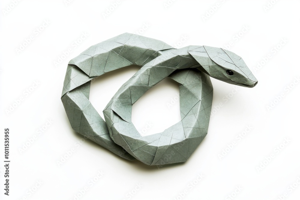 Coiled Origami Snake on White Surface Coiled Origami Snake on White Surface