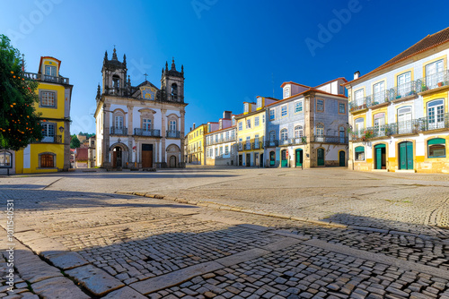 A historic town square with cobblestone streets and old architecture. photo