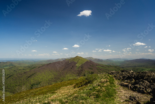 View of Polonina Carynska and Wetlinska with Chatka Puchatka and Trekking Tourists photo