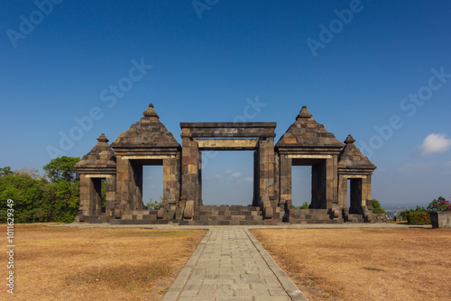 View entrance gate of Ratu Boko temple or called Keraton Ratu Boko at the morning, sky blue photo