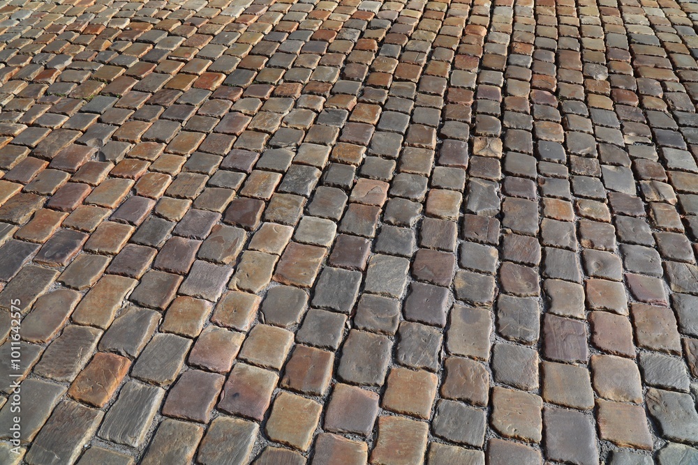 Porphyry stone pavement background in Prague Porphyry stone pavement background in Prague