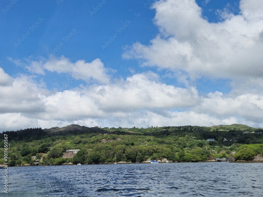 Serene River Waterscape With Gentle Waves And Cloud Reflections Serene River Waterscape With Gentle Waves And Cloud Reflections