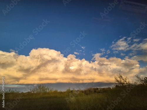 Serene Twilight: Orange And Pink Clouds At Sunset