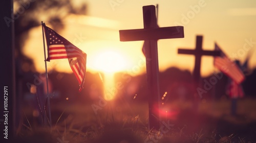 Set in a dusky cemetery, an American flag beside a grave casts a poignant silhouette against the setting sun, evoking respect and solemnity. photo