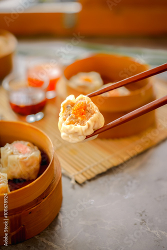 High angle of dim sum with chopstick