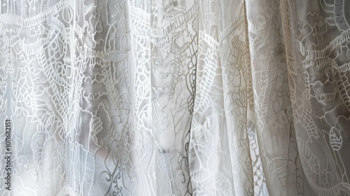 Delicate lace curtains bathed in soft light, creating an ethereal atmosphere of elegance and tranquility, with intricate patterns cascading gently.