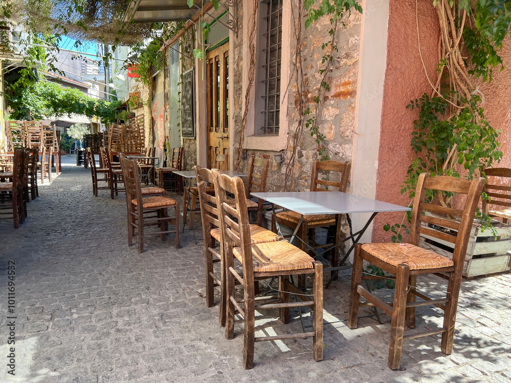 empty chair and tables of street cafe in the town empty chair and tables of street cafe in the town