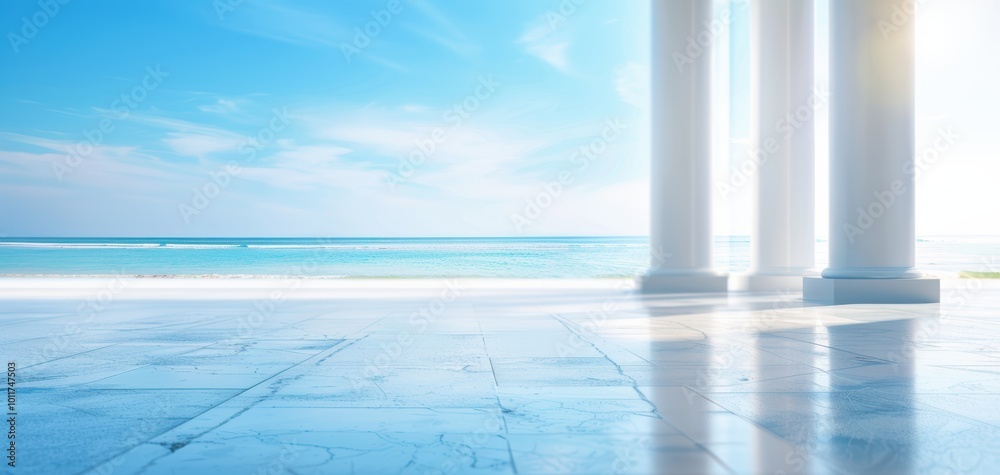 Fototapeta premium Serene beachfront view with classic pillars, bright skies, and calm ocean waters.