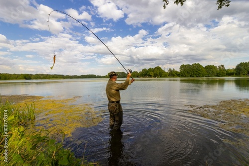 Fisherman fishes on the lake