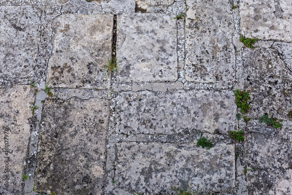 Fragment of stone wall of ancient castle close-up Fragment of stone wall of ancient castle close-up